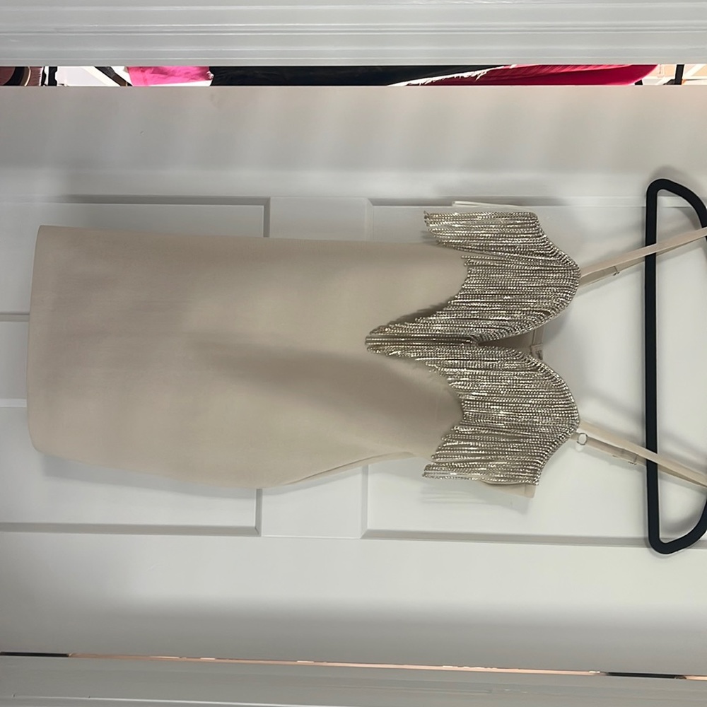 Cream color body com dress. Never worn! Perfect for bachelorette party